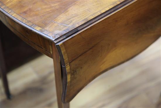 A George III mahogany and rosewood crossbanded butterfly wing Pembroke table, W.2ft 4in.